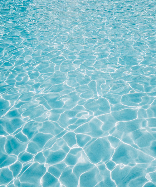 Blue swimming pool surface background